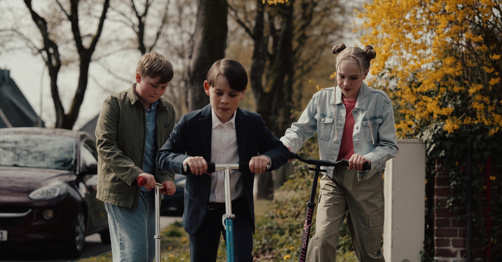 Enno, Josef und Marie auf den Rollern